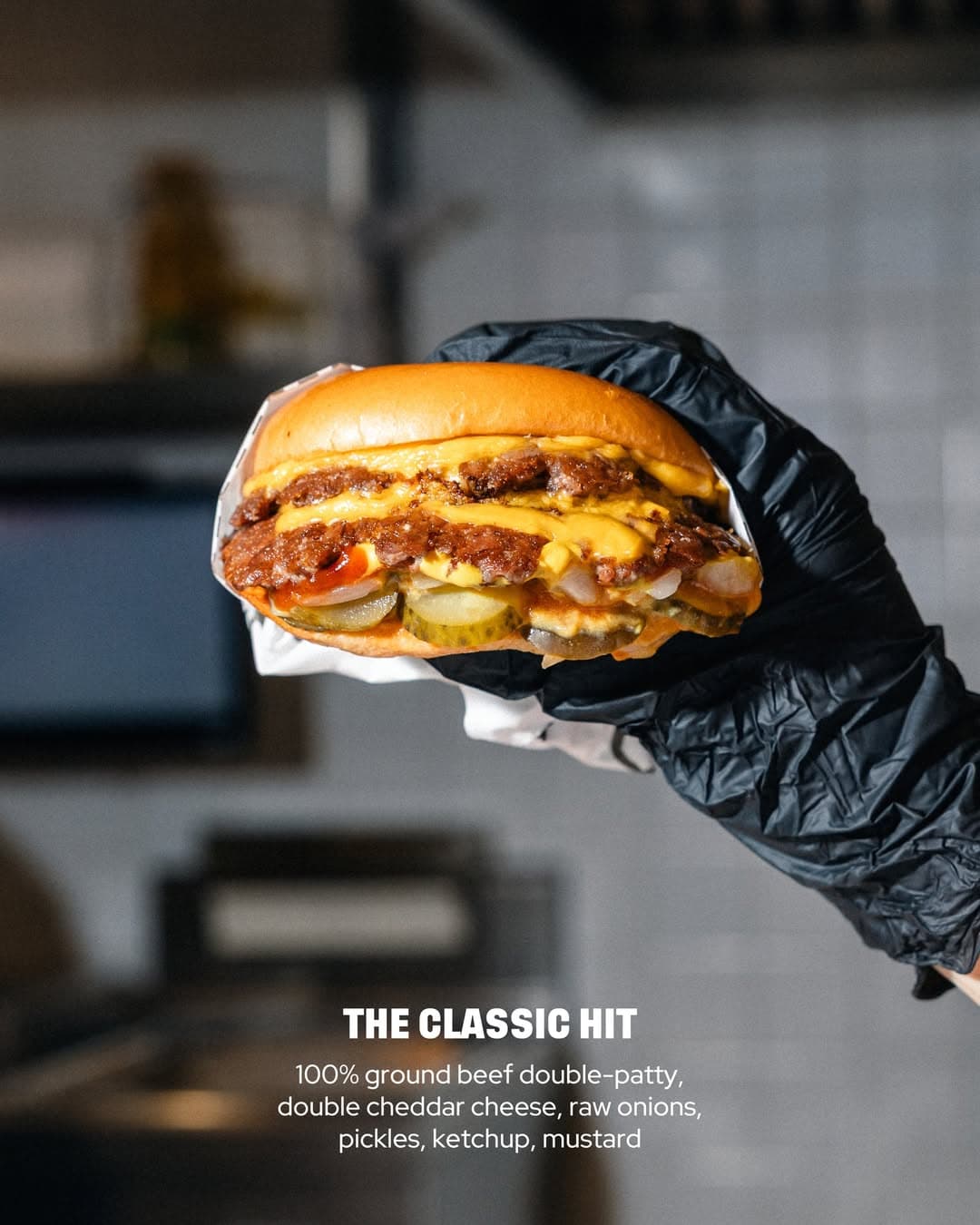 Heavy Hit smash burger being prepared on the grill